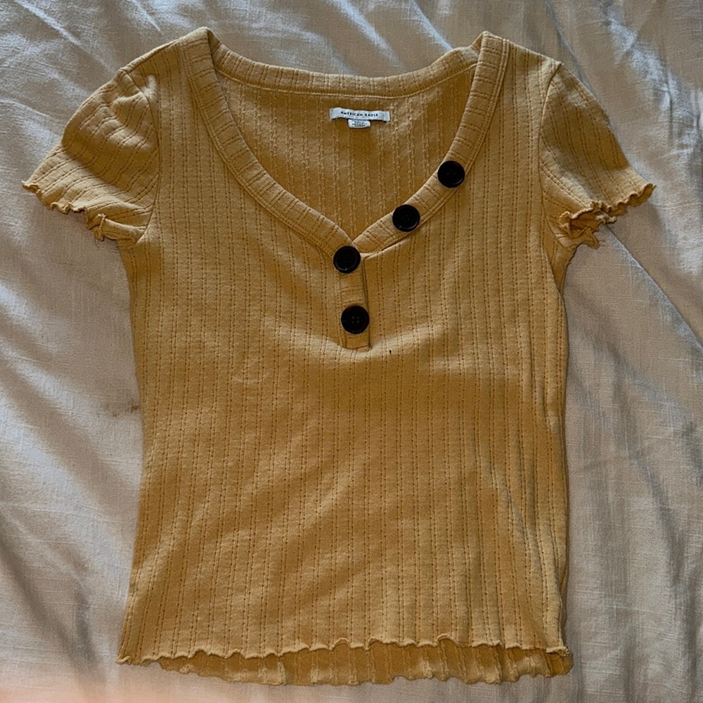 Yellow American eagle top with button detailing